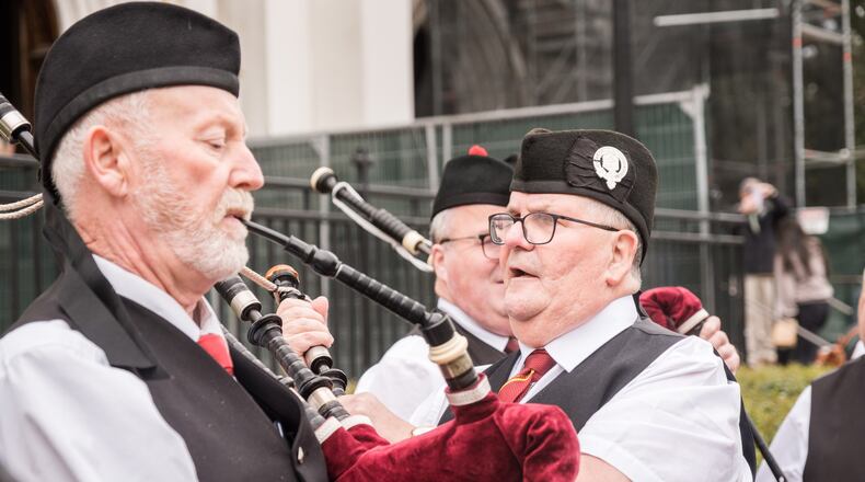 Members of the City of Limerick Pipe Band perform outside the Cathedral of St. John the Baptist in Savannah, GA on March 9, 2025. (Justin Taylor/The Atlanta Journal-Constitution)