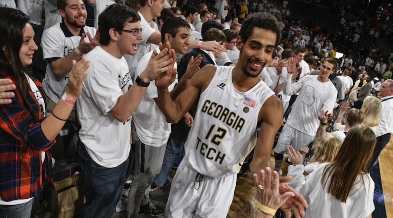 Georgia Tech forward Quinton Stephens celebrates with fans following the Jackets’ win over Syracuse Sunday at McCamish Pavilion (Special to the AJC)