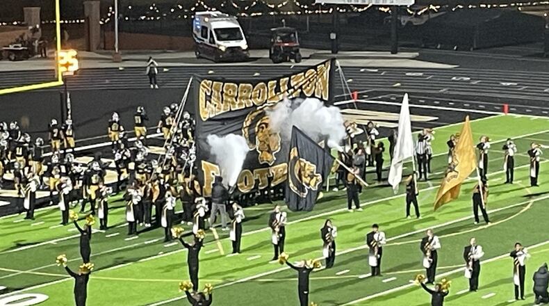 The No. 1-ranked Carrollton football team takes the field for its Class 6A football quarterfinal game against Hillgrove on Nov. 29, 2024, at Grisham Stadium in Carrollton.