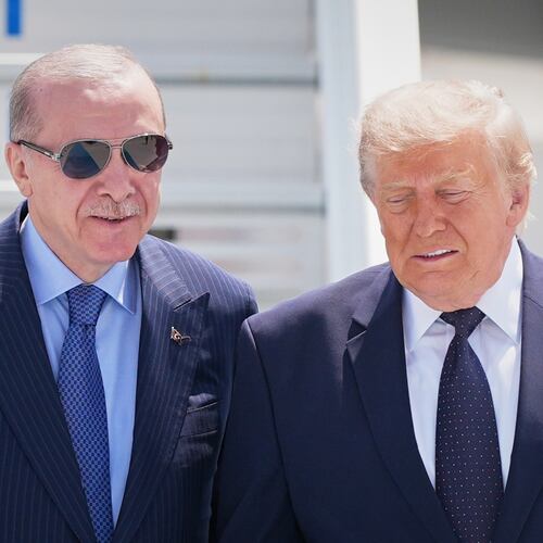 President Donald Trump walks with Turkish President Recep Tayyip Erdogan, left, upon arriving for the NATO summit in Ankara, Turkey, Tuesday, July 7, 2026. (AP Photo/Alex Brandon)