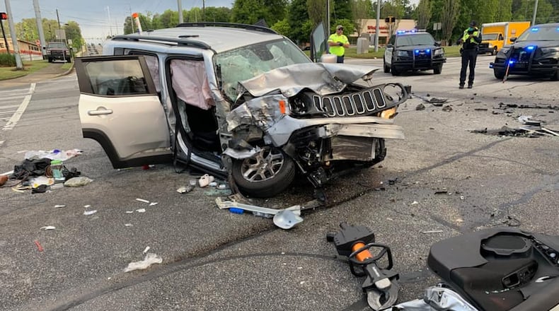 Authorities are investigating after a man ran from Smyrna police and crashed, leaving two of his passengers with serious injuries.