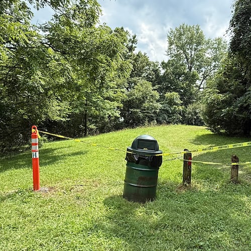 A section of the Riverside Dr Scioto Fishing Area is sectioned off on Tuesday, July 21, 2026, in Powell, Ohio. (AP Photo/Patrick Aftoora-Orsagos)