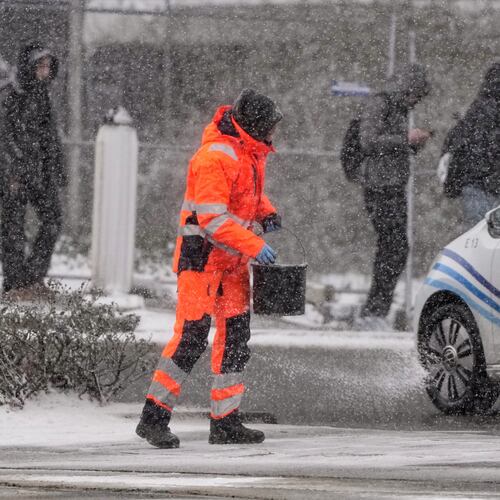 FILE - Salt is spread on a street in Gelsenkirchen, Germany, Jan. 7, 2026. (AP Photo/Martin Meissner, File)