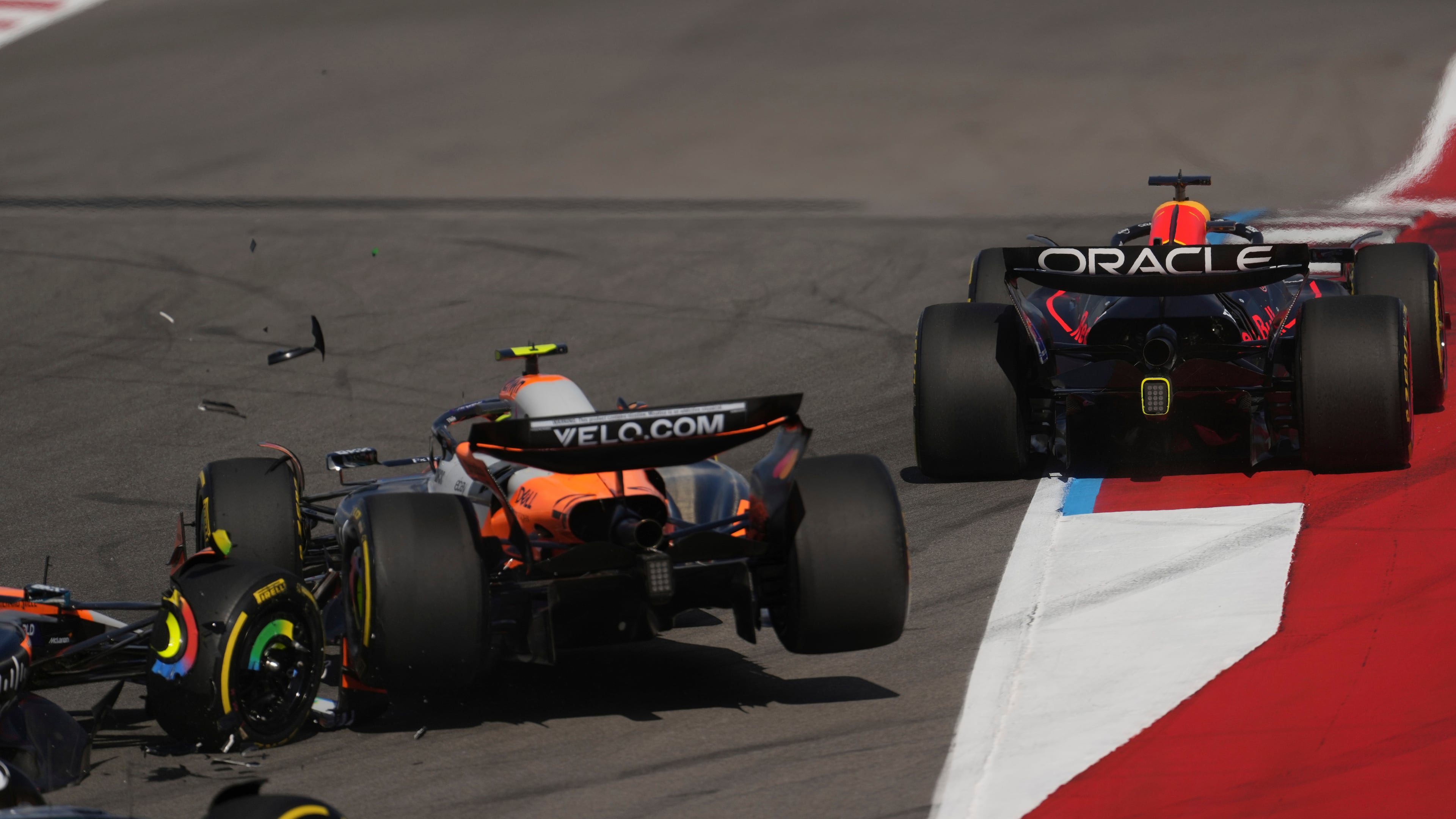 McLaren driver Lando Norris of Britain crashes during the sprint race at the Formula One U.S. Grand Prix auto racing in Austin, Texas, Saturday, Oct. 18, 2025.(AP Photo/Eric Gay)