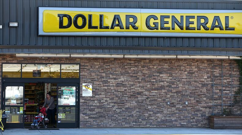 VALLEJO, CA - MARCH 12: A customer leaves a Dollar General store on March 12, 2015 in Vallejo, California. Dollar General Stores Inc. announced plans to open over 700 new stores in 2015 in an attempt to improve on its position among discount retailers in the United States. (Photo by Justin Sullivan/Getty Images)