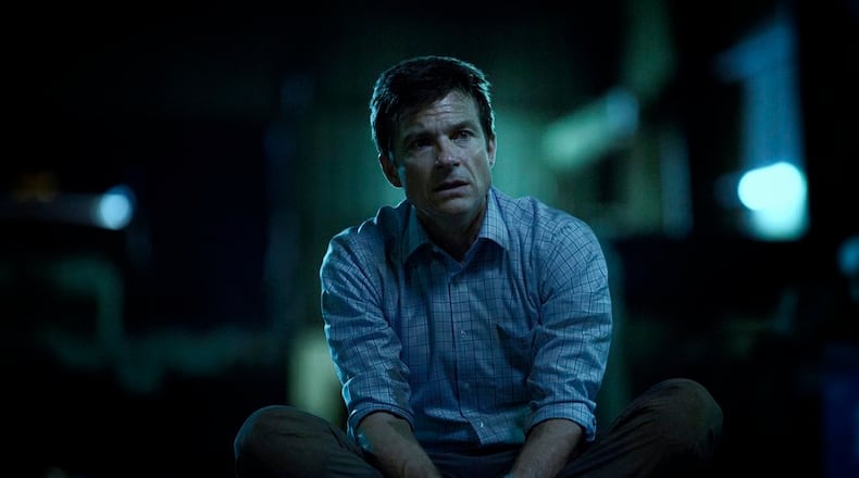 This image released by Netflix shows Jason Bateman in a scene from "Ozark." Bateman was nominated Thursday for an Emmy for outstanding lead actor in a drama series. The 70th Emmy Awards will be held on Monday, Sept. 17. (Jackson Davis/Netflix via AP)