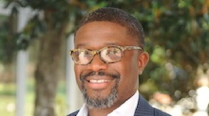 The Georgia First Generation Foundation’s Bobby Gueh Leadership Award is named after Bobby Gueh, a counselor at Gwinnett County's Lanier High School. COURTESY OF GWINNETT COUNTY PUBLIC SCHOOLS