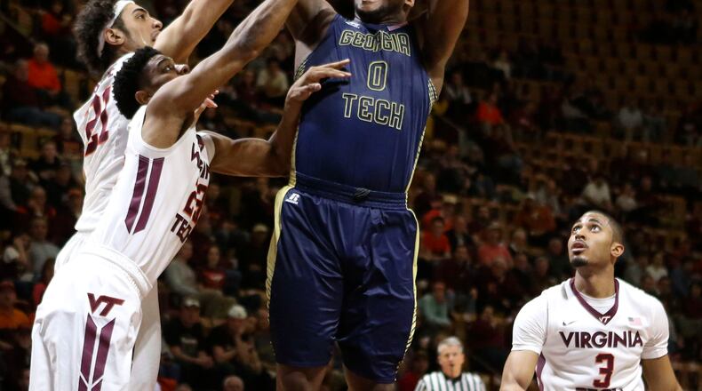Georgia Tech's Charles Mitchell (0) shoots while being defended by Georgia Tech during first half action of the NCAA basketball game in Blacksburg, Va., Monday, Feb. 9 2015. (AP Photo / The Roanoke Times, Matt Gentry) LOCAL TELEVISION OUT; SALEM TIMES REGISTER OUT; FINCASTLE HERALD OUT; CHRISTIANBURG NEWS MESSENGER OUT; RADFORD NEWS JOURNAL OUT; ROANOKE STAR SENTINEL OUT Georgia Tech forward Charles Mitchell scored a team-high 17 points and didn't commit a turnover for the second game in a row. (ASSOCIATED PRESS)