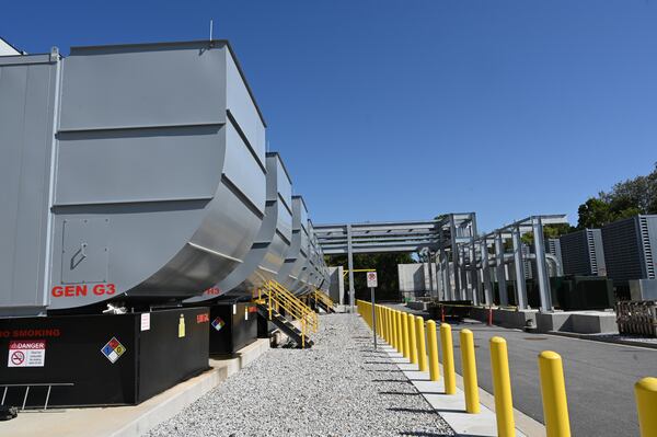 August 31, 2022 Atlanta - Photo shows gigantic generators during a tour of the inside QTS’s Atlanta Data Center Campus in Atlanta on Wednesday, August 31, 2022. QTS Mega Data Center campus, featuring its own on-site Georgia Power substations and direct fiber access to a wide variety of carrier alternatives. (Hyosub Shin / Hyosub.Shin@ajc.com)
