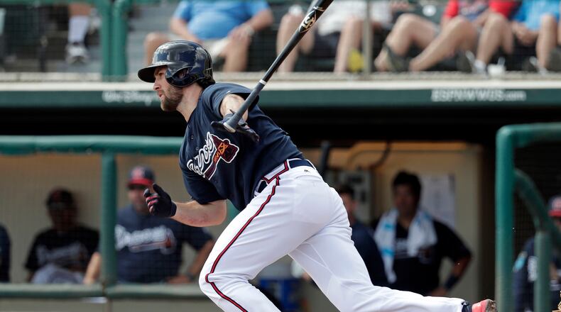 Braves utility player Charlie Culberson (pictured) bears a striking resemblance to teammate Dansby Swanson. (AP Photo/John Raoux)