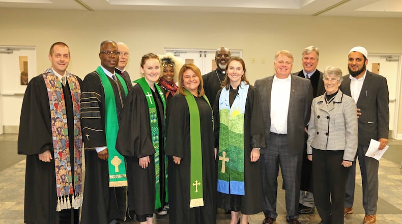 Alpharetta clergy pose for a photo after a recent Thanksgiving Day service.