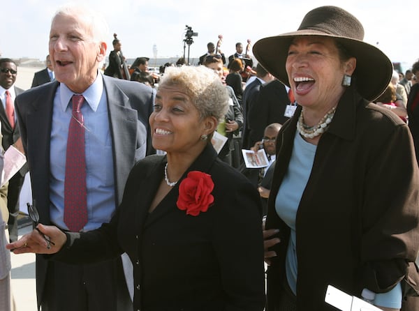 Then-Delta CEO Gerald Grinstein, Atlanta Mayor Shirley Franklin, and Valerie Jackson, widow of former Atlanta Mayor Maynard Jackson (left to right) laugh during the opening ceremony of the new fifth runway at Hartsfield-Jackson Atlanta International Airport on Tuesday, May 16, 2006. It was dubbed "the most important runway in America" because it allowed Atlanta to hold its title as the "world's busiest." (Johnny Crawford/AJC)