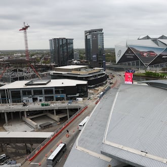 Mercedes-Benz Stadium is seen from The Center, formerly CNN Center, in Atlanta on March 30, 2026. (Arvin Temkar/AJC)