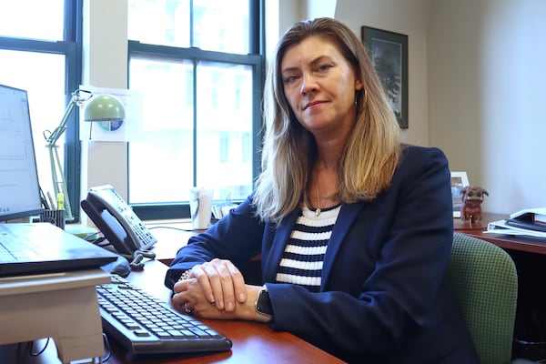 Massachusetts Health Connector Executive Director Audrey Morse Gasteier poses for a portrait at her desk in the state health insurance marketplace's office Tuesday, July 2, 2025, in Boston. (AP Photo /Leah Willingham)