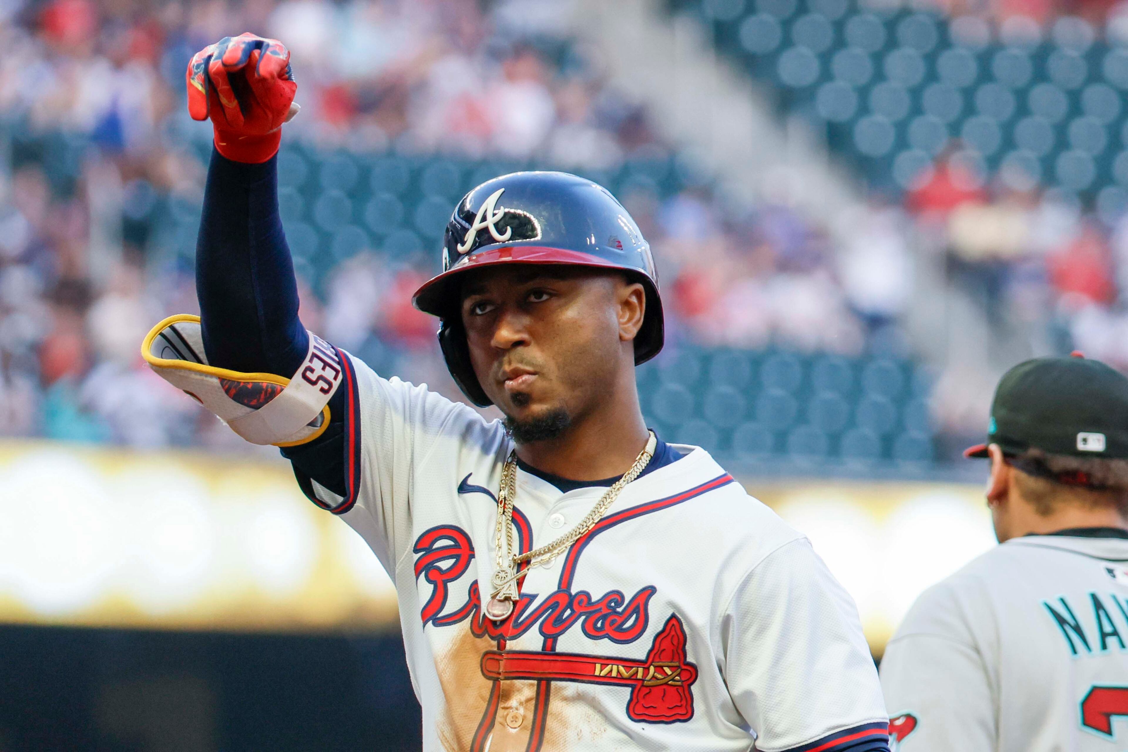 Atlanta Braves second base Ozzie Albies (1) signals to his teammates after hiting an RBI-single during the fourth inning against the Arizona Diamondbacks at Truist Park on Tuesday, June 3, 2025, in Atlanta.
(Miguel Martinez/ AJC)