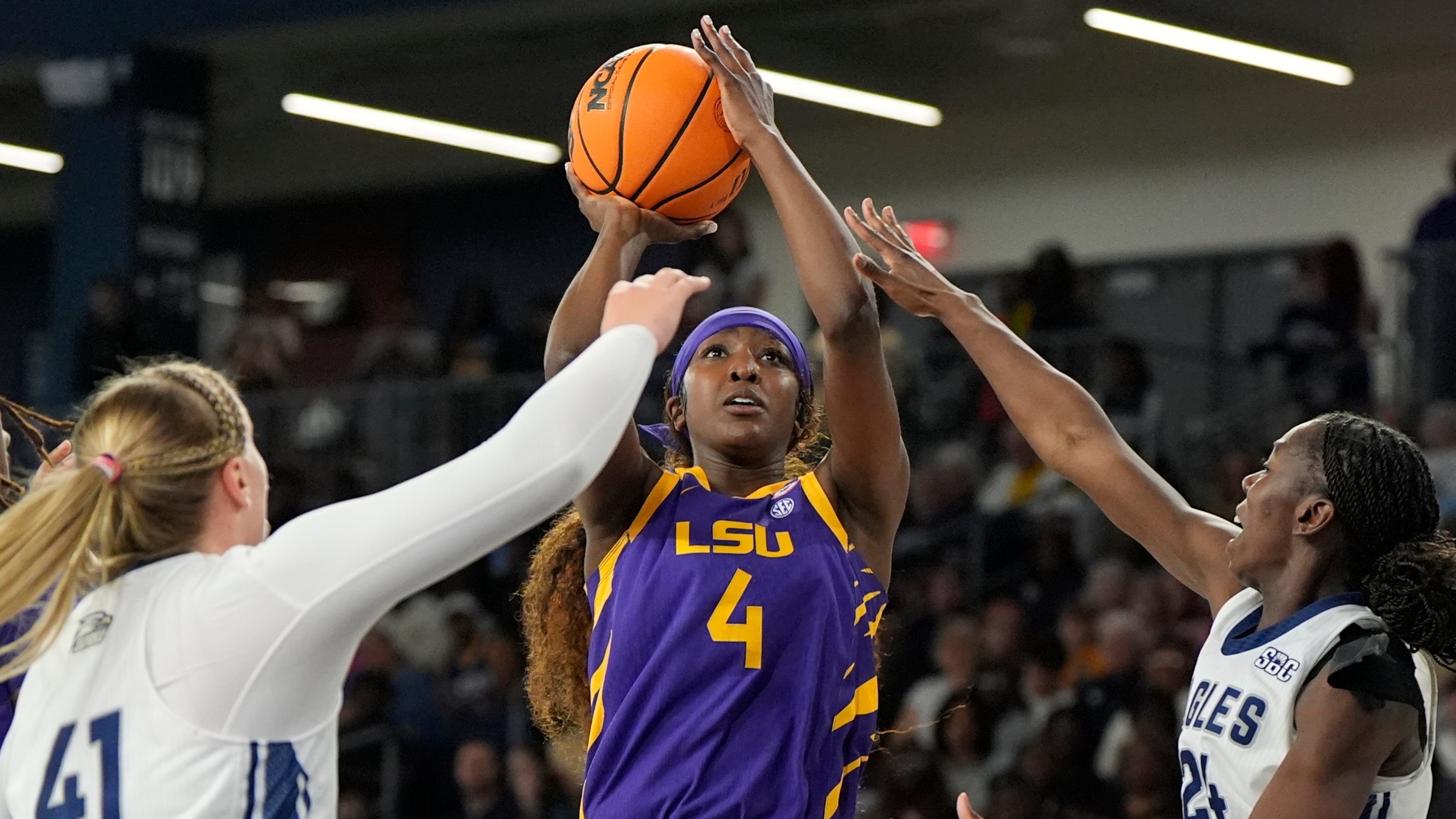 Louisiana State guard Flau'Jae Johnson (4) shoots against Georgia Southern during the first half of an NCAA women's basketball game, Sunday, Nov. 9, 2025, in Statesboro. (AP Photo/Mike Stewart)