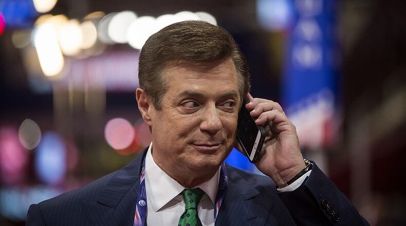 Paul Manafort, then Donald Trump's presidential campaign manager, talks on the phone at the Republican National Convention in Cleveland, July 17, 2016. (Eric Thayer / The New York Times)