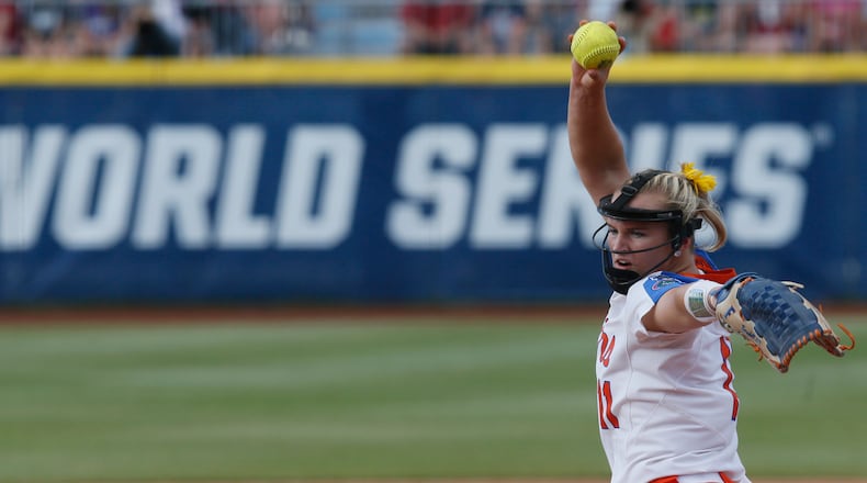 Florida's Kelly Barnhill (11) pitches in championship series against Oklahoma in the NCAA Women's College World Series in Oklahoma City, Monday, June 5, 2017.