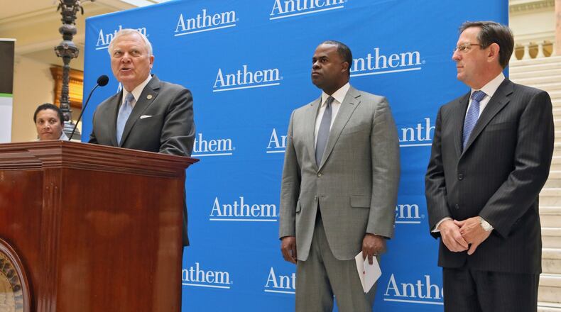 October 26, 2016 - Atlanta - Gov. Nathan Deal (left) Atlanta Mayor Kasim Reed and Anthem Senior Vice President and Chief Information Officer Tom Miller make the announcement. Health care giant Anthem plans an 1,800-job expansion in downtown Atlanta, company and political leaders said Wednesday. The parent of Blue Cross/Blue Shield of Georgia will take space in the Bank of America Plaza tower just north of downtown. Jobs involved will be mainly in software development. BOB ANDRES /BANDRES@AJC.COM