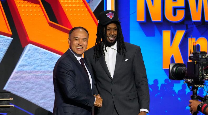 Bruce Thornton poses for a photo with NBA Deputy Commissioner Mark Tatum after being selected by the New York Knicks in the second round of the NBA basketball draft Wednesday, June 24, 2026, in New York. (AP Photo/Yuki Iwamura)