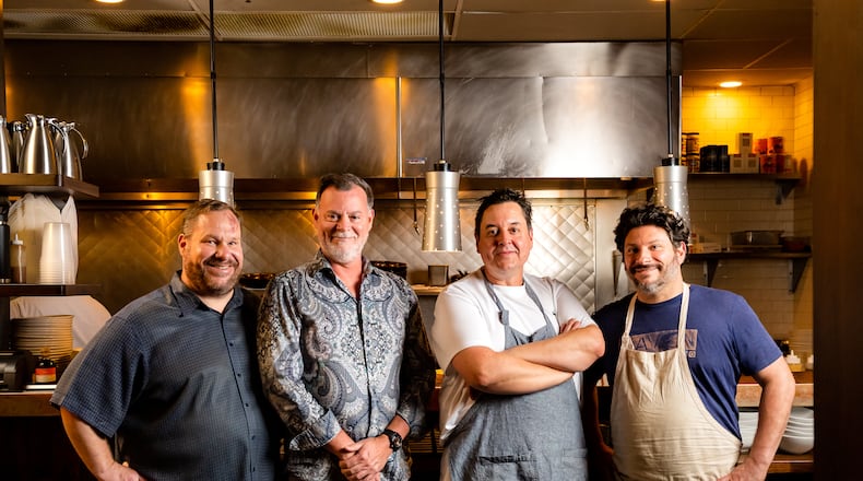 Word of Mouth Restaurants' team: From left, Ron Eyester, Michel Arnette, Matt Swickerath and Stephen Herman. (Courtesy of Lauren Hubbard / Lauren Liz Photo)