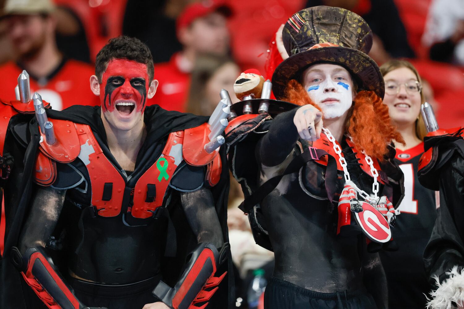 Members of the Georgia Spike Squad cheer before the College Football Playoff Semifinal between the Georgia Bulldogs and the Ohio State Buckeyes at the Chick-fil-A Peach Bowl In Atlanta on Saturday, Dec. 31, 2022. (Jason Getz / Jason.Getz@ajc.com)