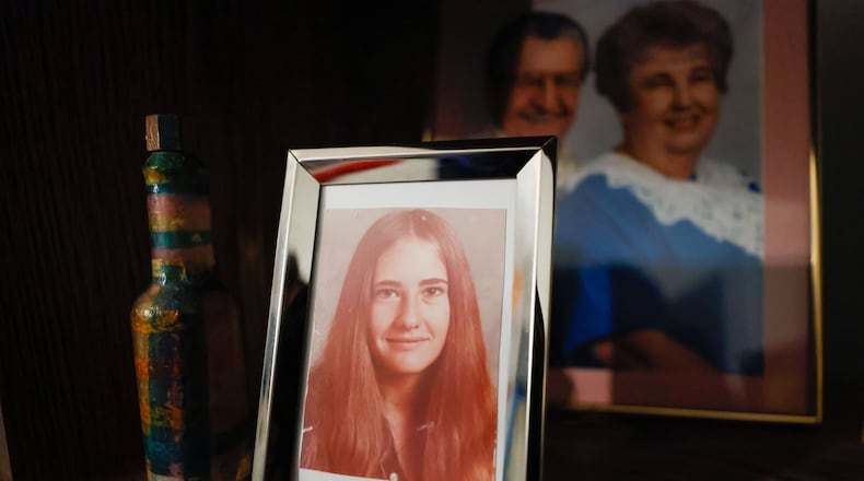 A photograph of Carlene Tengelsen sits a bookshelf in her sister's house. She went missing in 1972 at age 16 and was never seen by her family again. Photo by Miguel Martinez /miguel.martinezjimenez@ajc.com