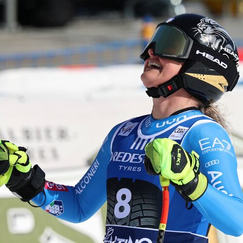 Italy's Laura Pirovano celebrates at the finish area of an alpine ski, women's World Cup downhill, in Val di Fassa, Italy, Friday, February. 27, 2026. (AP Photo/Marco Trovati)