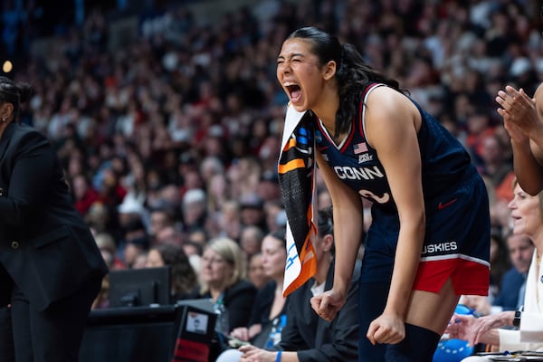 UConn center Jana El Alfy reacts during the second half against Southern California in the Elite Eight of the NCAA college basketball tournament Monday, March 31, 2025, in Spokane, Wash. (AP Photo/Jenny Kane)