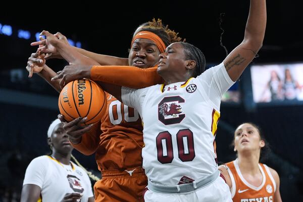 Texas center Kyla Oldacre (left) and South Carolina guard Ta'Niya Latson are among the rising stars in college women's basketball. (Eric Gay/AP)