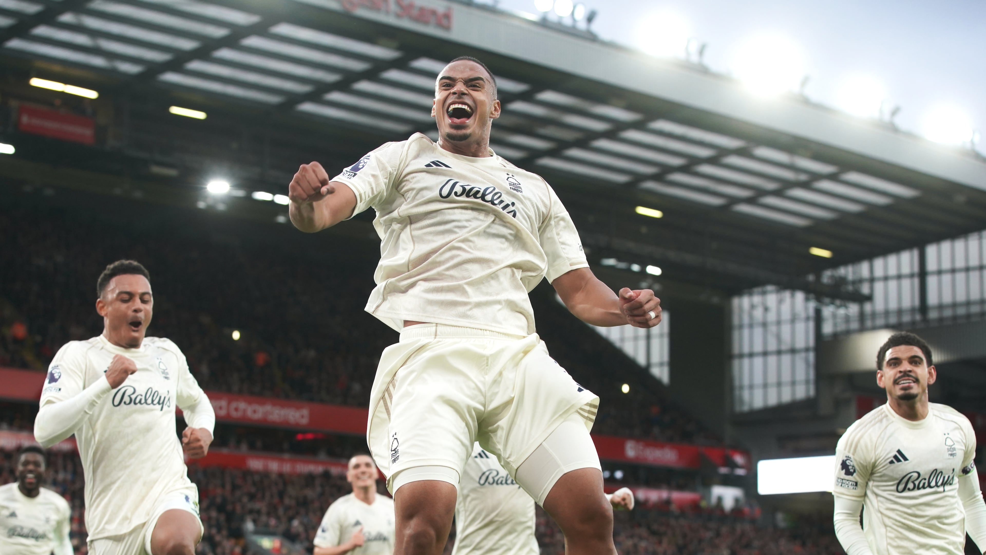 Nottingham Forest's Murillo, centre, celebrates after scoring his side's opening goal during the English Premier League soccer match between Liverpool and Nottingham Forest in Liverpool, England, Saturday, Nov. 22, 2025. (AP Photo/Ian Hodgson)