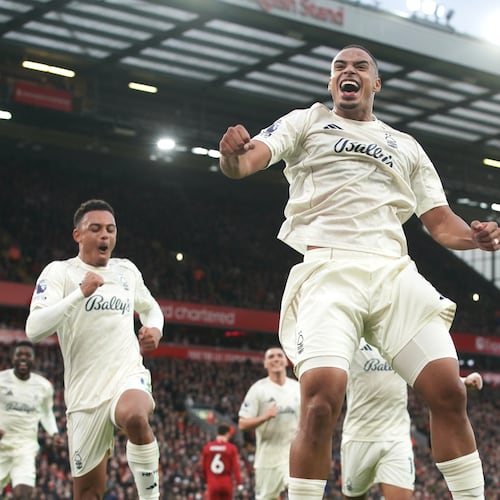 Nottingham Forest's Murillo, centre, celebrates after scoring his side's opening goal during the English Premier League soccer match between Liverpool and Nottingham Forest in Liverpool, England, Saturday, Nov. 22, 2025. (AP Photo/Ian Hodgson)