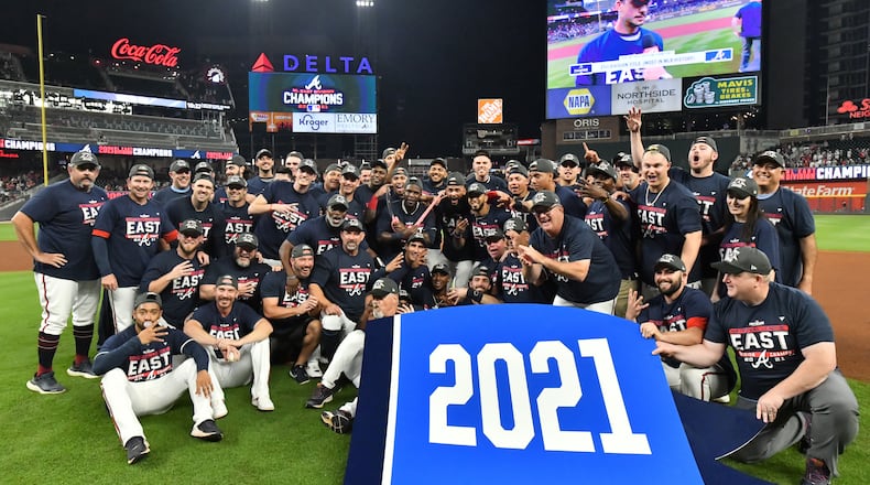 Atlanta Braves players celebrate their victory at Truist Park on Thursday, September 30, 2021. Atlanta Braves won 5-3 over Philadelphia Phillies. (Hyosub Shin / Hyosub.Shin@ajc.com)
