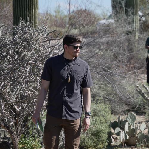 Law enforcement agents check vegetation areas around Nancy Guthrie’s home in Tucson, Ariz., Wednesday, Feb. 11, 2026. (AP Photo/Ty ONeil)
