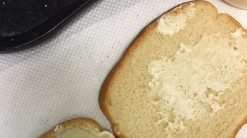 Making our banana and mayo sandwiches.