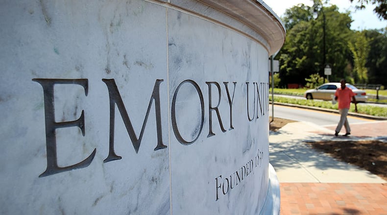 August 21, 2012 - Atlanta, Ga: The Emory University sign is shown along North Decatur Road at the main entrance to Emory University campus a week before fall term classes start Tuesday afternoon in Atlanta, Ga., August 21, 2012. For more than a decade, Emory University has intentionally misreported the SAT and ACT scores of its enrolled students, the university acknowledged in a statement on Friday after a three-month investigation.The private institution is ranked 20th in the nation, according to U.S. News & World Report. The publication rankings are based on a number of factors, including data reported by universities. JASON GETZ / JGETZ@AJC.COM