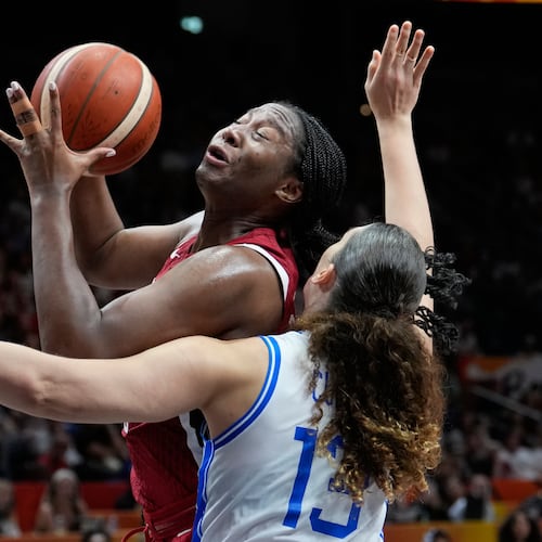Aliyah Boston, of the United States, shoots over Italy's Lorela Cubaj during the Women's Basketball World Cup match between the United States and Italy in Berlin, Sunday, Sept. 6, 2026. (AP Photo/Ebrahim Noroozi)