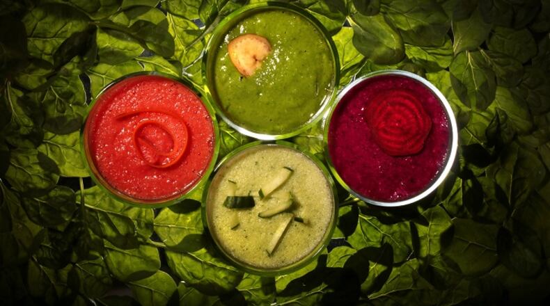 Healthful smoothies (clockwise from left) are Icy Carrot Cooler, It's Easy Bein' Green, Mixed Berry and Beet, and Green 'n Lean. (Robert Cohen/St. Louis Post-Dispatch/TNS)