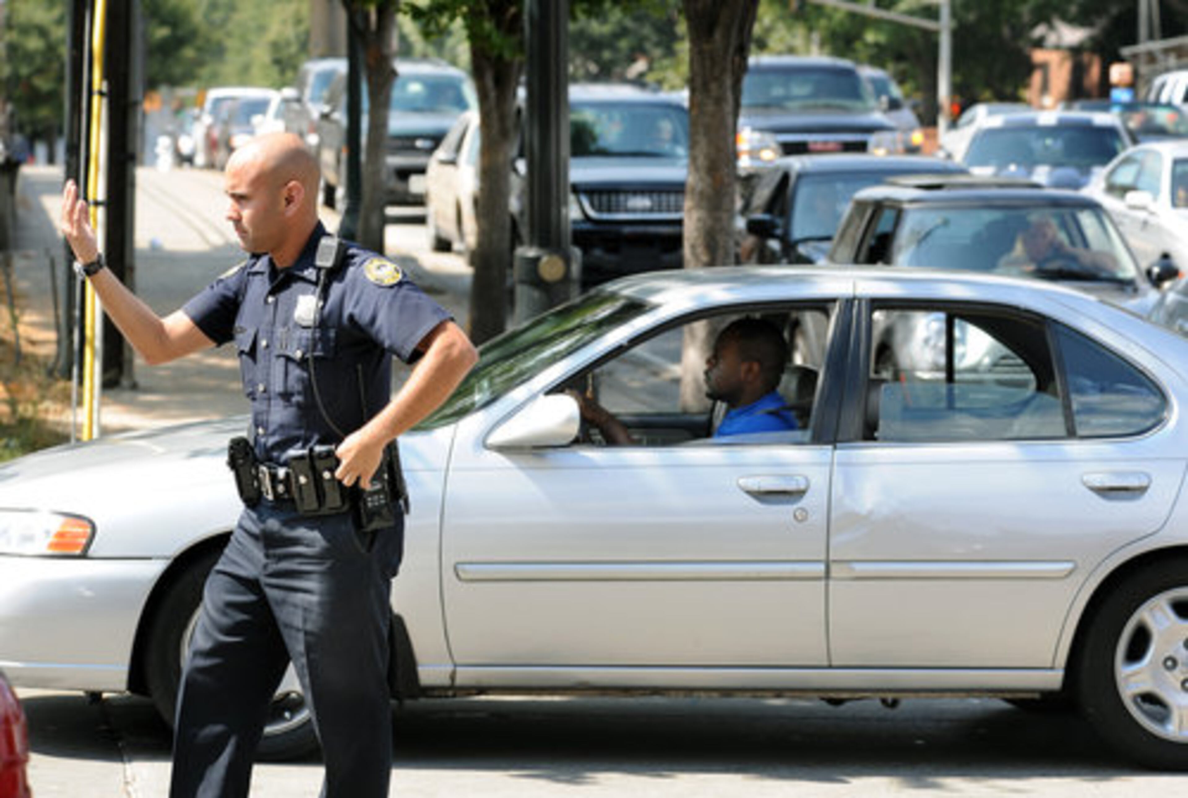 Sept. 2008 -- Atlanta police officer J.L. Santa helped with directing traffic into the BP Station from North Ave. In downtown Atlanta, wait times to buy gasoline were 45 minutes to 1 1/2 hours during the 2008 shortage.