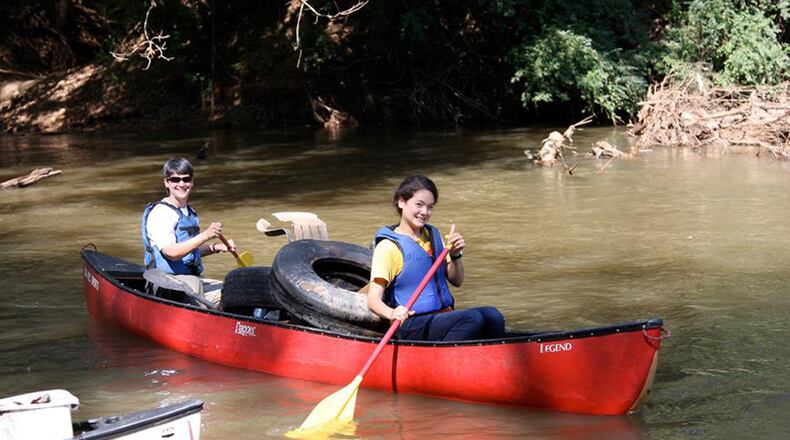 Volunteers at a past Rivers Alive clean-up return with a canoe filled with litter and debris. The annual Rivers Alive clean-up with Keep Roswell Beautiful and the city of Roswell is set for Saturday, Sept. 19, at East Roswell Park. RIVERS ALIVE via Facebook