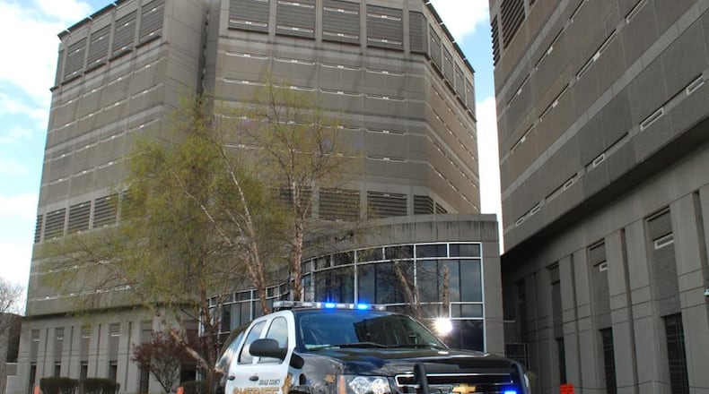 A DeKalb County jailer pleaded guilty Monday to using executive force against inmates and was sentenced to a year in a probation detention center, according to DeKalb District Attorney Sherry Boston.