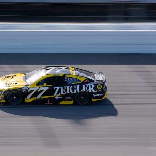 Carson Hocevar (77) drives during a NASCAR Cup Series auto race at Michigan International Speedway in Brooklyn, Mich., Sunday, June 7, 2026. (AP Photo/Paul Sancya)