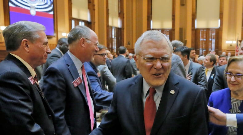Gov. Nathan Deal exits the House chamber after he outlined his agenda in his final State of the State speech before a joint session of the General Assembly. BOB ANDRES /BANDRES@AJC.COM