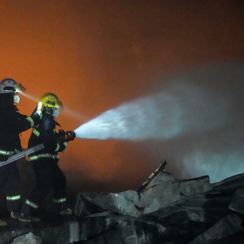 In this photo released by Xinhua News Agency, firefighters work to out the fire after an explosion at a fireworks plant in Guandu Town of Liuyang, central China's Hunan Province, in the early hours of May 5, 2026. (Chen Sihan/Xinhua via AP)