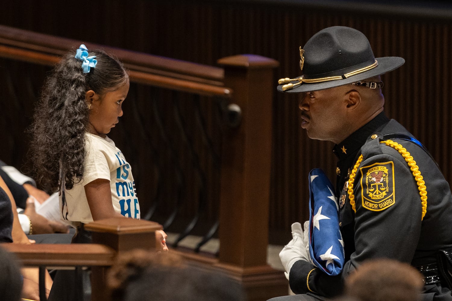 Flags fly at half-staff for slain DeKalb officer’s memorial service

