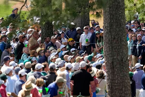 Rory McIlroy, of Northern Ireland, hits from the rough on the seventh hole during the third round at the Masters golf tournament, Saturday, April 12, 2025, in Augusta, Ga. (AP Photo/David J. Phillip)