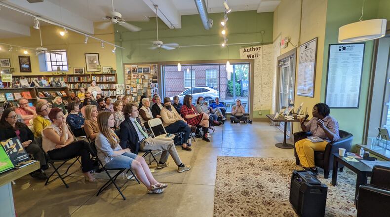 Marlanda Dekine reads at the book launch for their poetry collection "Thresh & Hold" at the Hub City Bookshop in Spartanburg, South Carolina.
(Courtesy of Hub City Press/ Meg Reid)