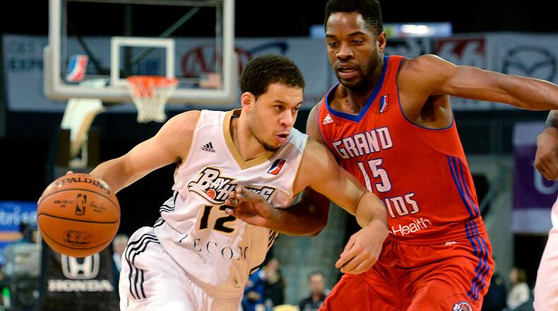 In a file photo, Erie BayHawks’ Seth Curry tries to get past Grand Rapids Drive’s Kelsey Barlow during an NBA D League basketball game Saturday, Jan. 10, 2015, in Erie, Pa. (AP Photo/Erie Times-News, Jack Hanrahan)