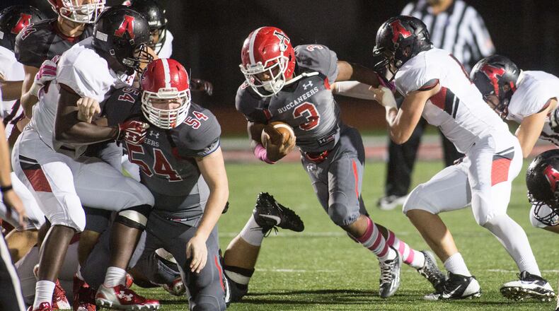 Allatoona High School Running Back Russell Halimon (3) runs for yardage against Alexander High School during the first half of a high school football game, Friday, Oct. 2, 2015, in Acworth, Ga. BRANDEN CAMP/SPECIAL