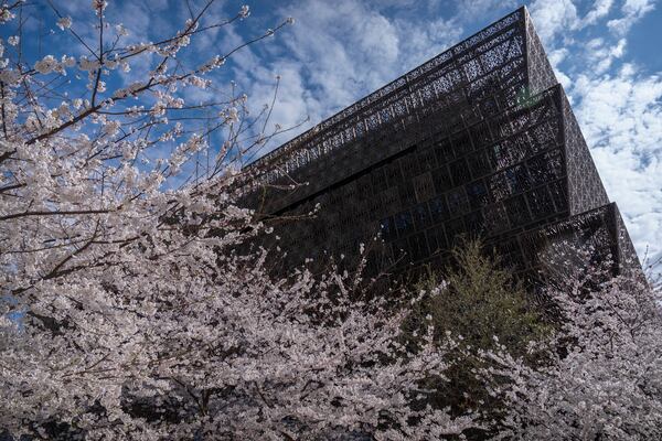 The National Museum of African American History and Culture on the National Mall is seen on Friday, March 28, 2025, in Washington. (AP Photo/Mark Schiefelbein)